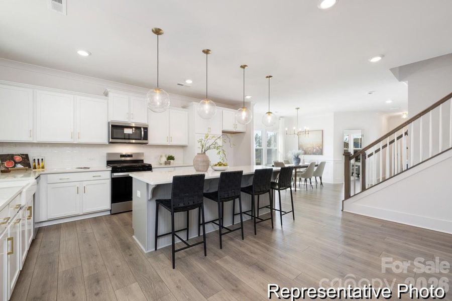 Furnished interior view inside a new home in Whispering Hills, Locust (Image 4).