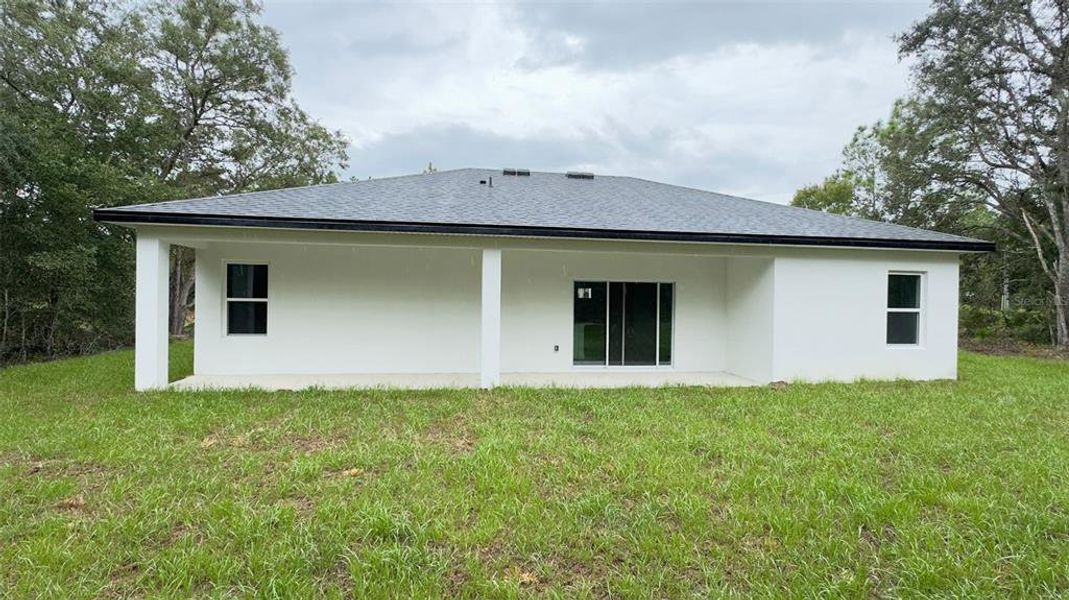 Front exterior of a new home in , Citrus Springs, FL, highlighting curb appeal (Image 18).