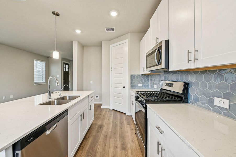 Photo is not of the actual home, but is an inspirational photo of builder’s model home and may depict options, furnishings, and/or decorator features that are not included