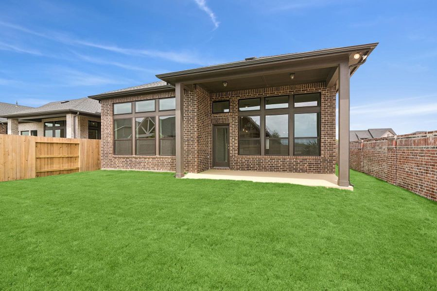 Front exterior of a new home in Grange 45' Homesites, Katy, TX, highlighting curb appeal (Image 2).