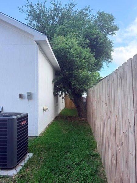 Exterior details and patio area of a home in , Baytown (Image 11).