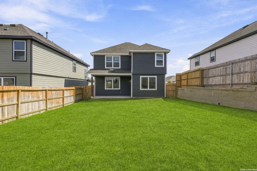 Exterior details and patio area of a home in Hickory Ridge, Elmendorf (Image 19).