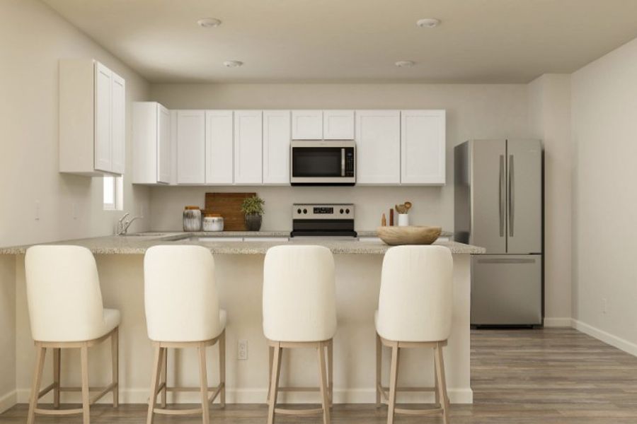 A kitchen with white cabinets. A kitchen with white cabinets.
