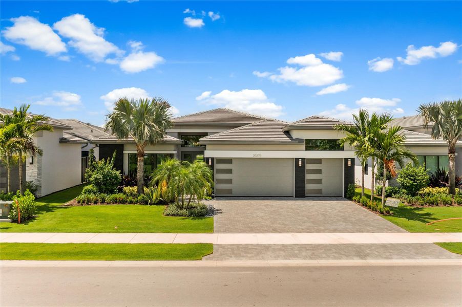 Front exterior of a new home in , Boca Raton, FL, highlighting curb appeal (Image 28). Front exterior of a new home in , Boca Raton, FL, highlighting curb appeal (Image 28).