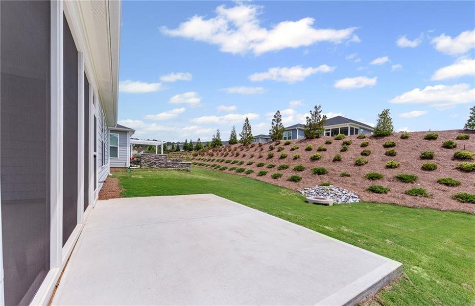 Front exterior of a new home in Sun City Peachtree, Griffin, GA, highlighting curb appeal (Image 17).