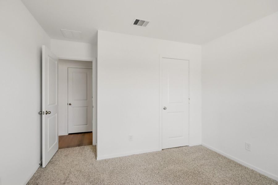 Spacious, unfurnished interior of a new home in New Waverly Station, New Waverly (Image 13). Spacious, unfurnished interior of a new home in New Waverly Station, New Waverly (Image 13).