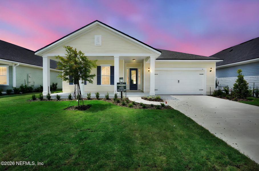 Front exterior of a new home in Forest Park at Wildlight, Yulee, FL, highlighting curb appeal (Image 28).