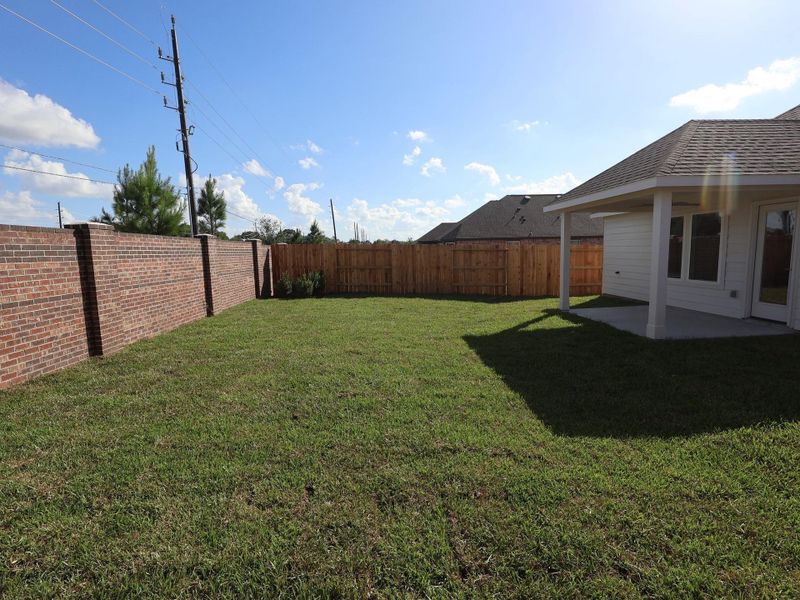 Exterior details and patio area of a home in Hallimore Ranch, Rosenberg (Image 3).