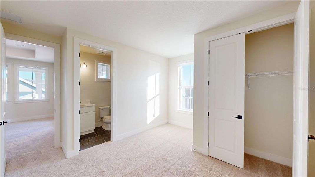 Spacious, unfurnished interior of a new home in Laureate Park, Orlando (Image 24).