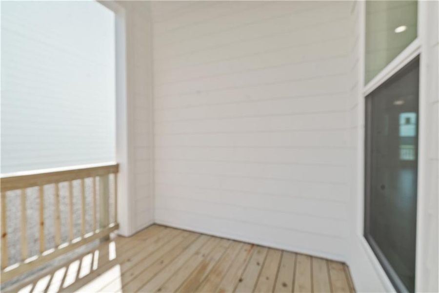 Exterior details and patio area of a home in Palisades Single Family, Cumming (Image 21).