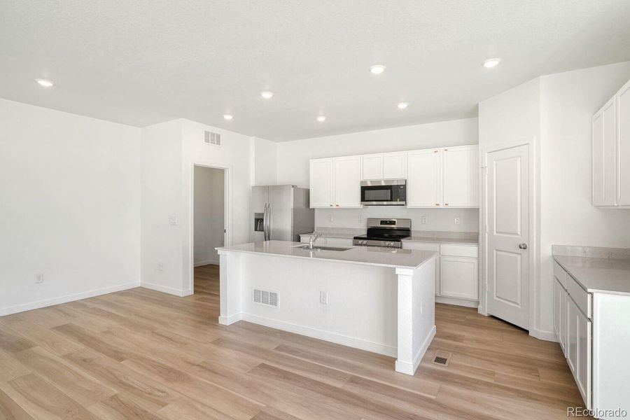 Furnished interior view inside a new home in Muegge Farms, Bennett (Image 5).