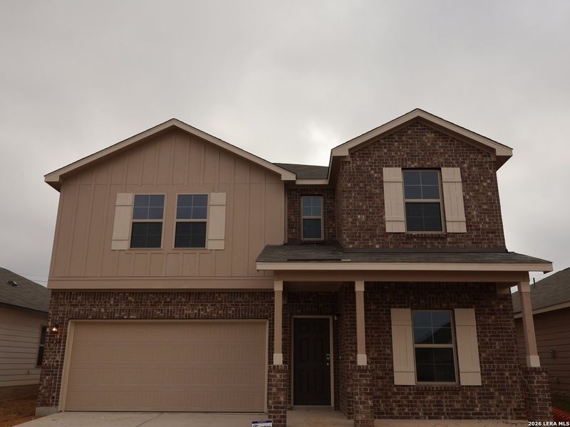 Front exterior of a new home in Agave, San Antonio, TX, highlighting curb appeal (Image 1). Front exterior of a new home in Agave, San Antonio, TX, highlighting curb appeal (Image 1).