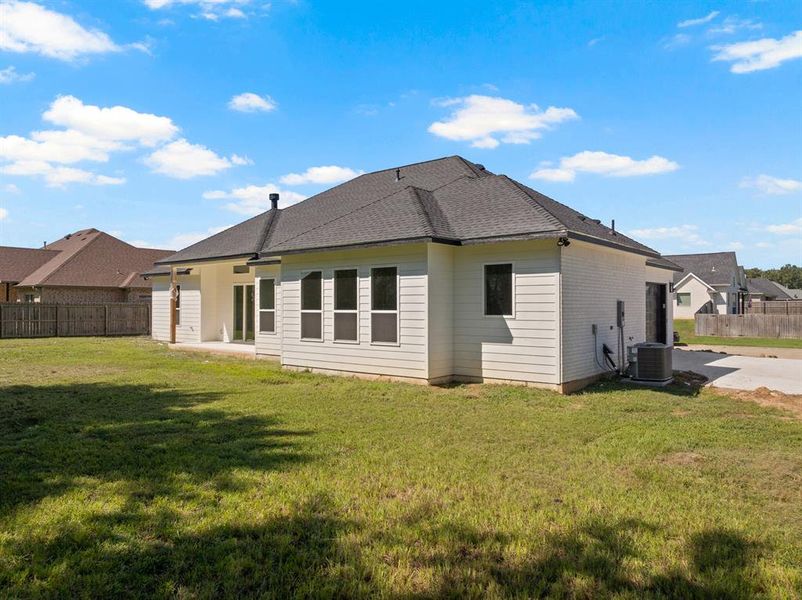 Front exterior of a new home in , Mount Pleasant, TX, highlighting curb appeal (Image 26). Front exterior of a new home in , Mount Pleasant, TX, highlighting curb appeal (Image 26).
