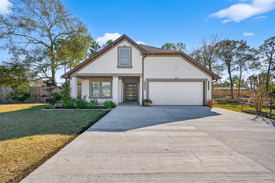Front exterior of a new home in , Conroe, TX, highlighting curb appeal (Image 2). Front exterior of a new home in , Conroe, TX, highlighting curb appeal (Image 2).