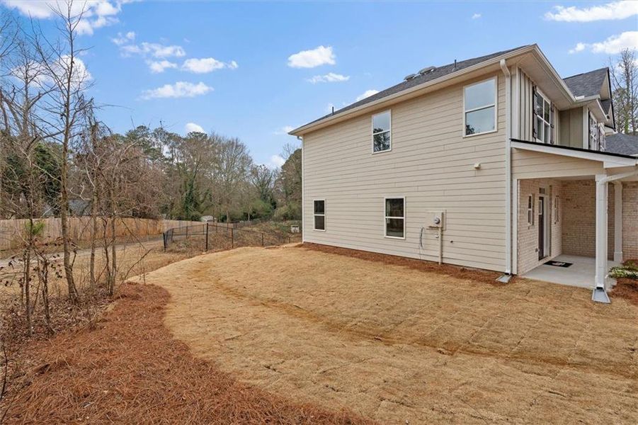 Exterior details and patio area of a home in Canterbury Villas, Carrollton (Image 25).