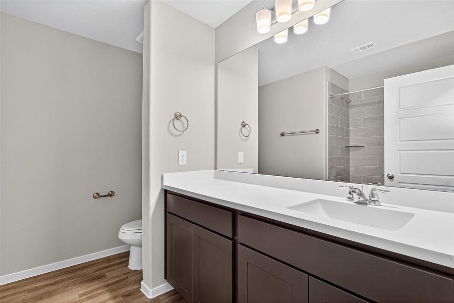 Furnished interior view inside a new home in Mill Creek Trails, Magnolia (Image 5). Furnished interior view inside a new home in Mill Creek Trails, Magnolia (Image 5).