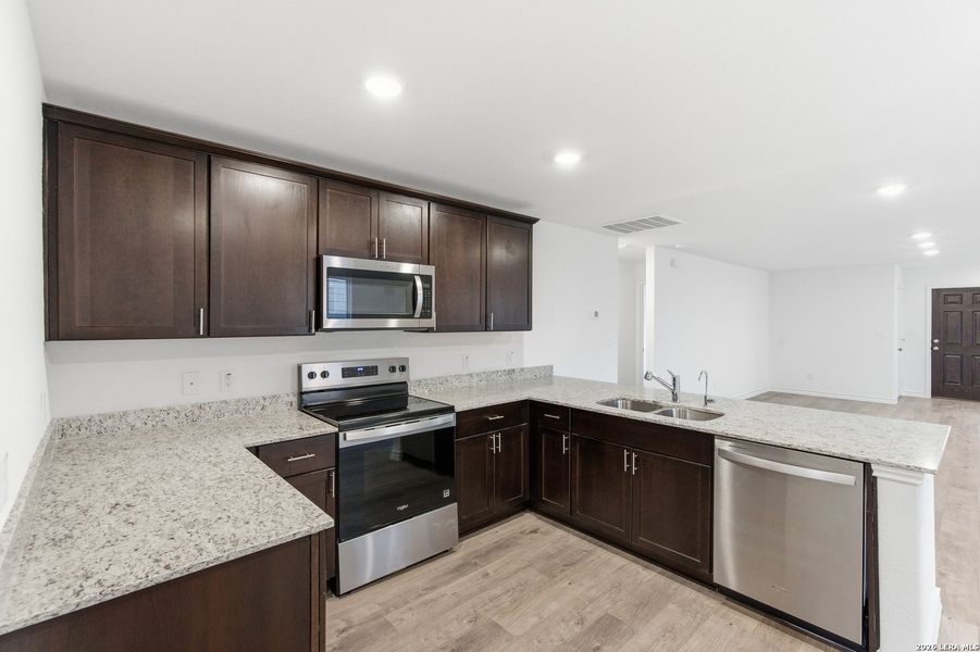 Furnished interior view inside a new home in Vista Real, Converse (Image 8). Furnished interior view inside a new home in Vista Real, Converse (Image 8).