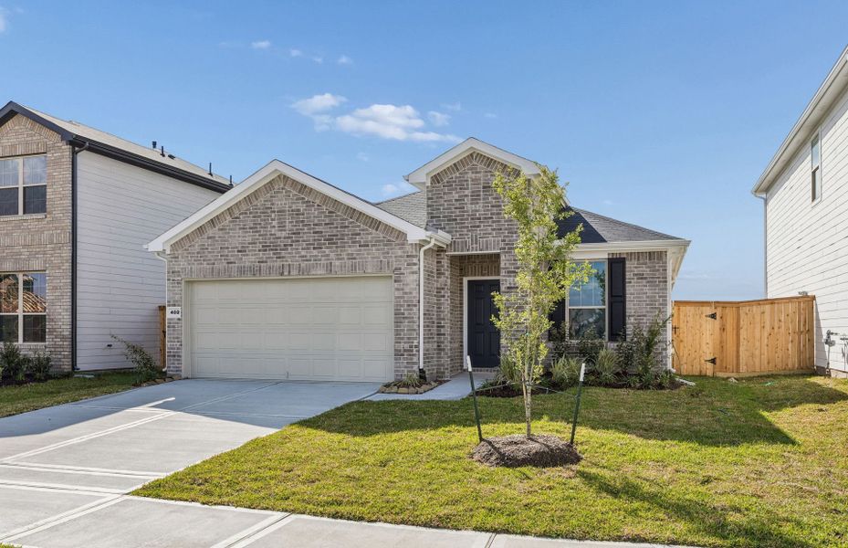Front exterior of a new home in Crosby Farms, Crosby, TX, highlighting curb appeal (Image 20).