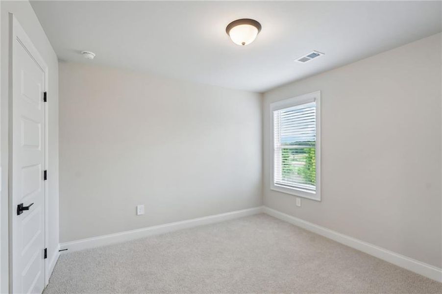 Spacious, unfurnished interior of a new home in Vines at Mill Creek - Estate Series, Braselton (Image 34). Spacious, unfurnished interior of a new home in Vines at Mill Creek - Estate Series, Braselton (Image 34).
