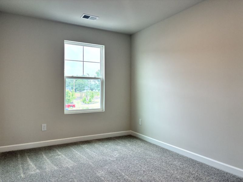Spacious, unfurnished interior of a new home in Reidville Town Center, Reidville (Image 14).