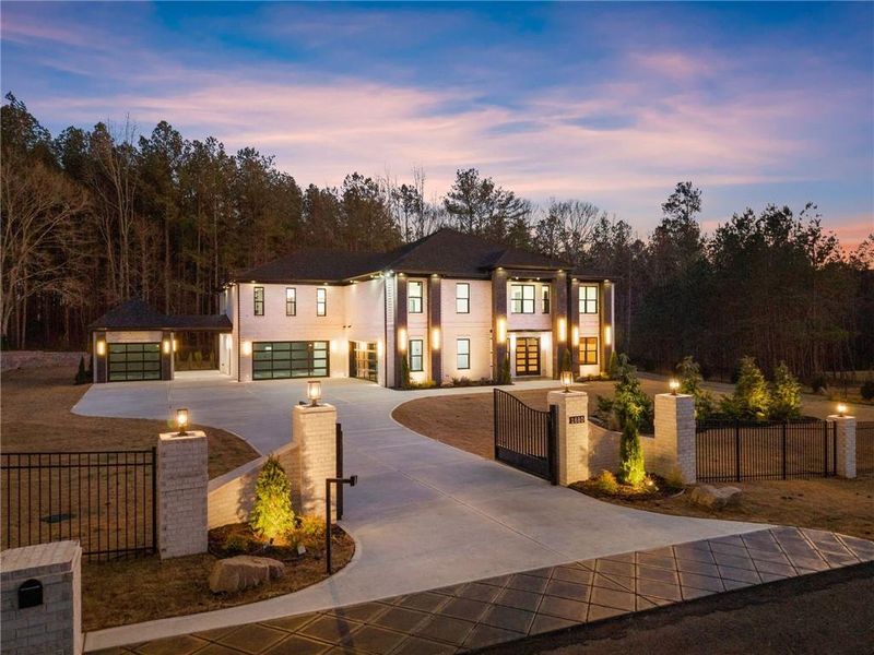 Front exterior of a new home in , Hoschton, GA, highlighting curb appeal (Image 41).