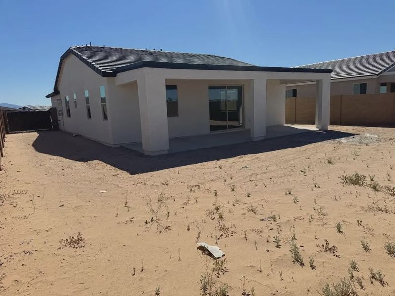 Exterior details and patio area of a home in Camilo at Santana, Yuma (Image 3).