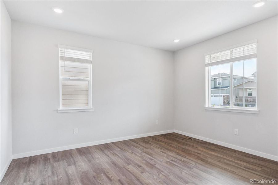 Spacious, unfurnished interior of a new home in Floret Collection at Alder Creek, Parker (Image 16).