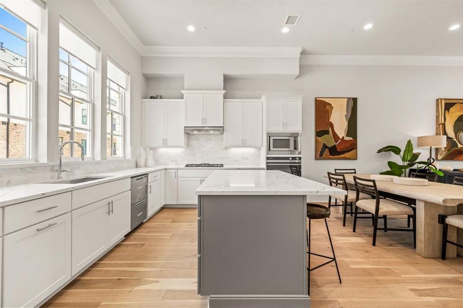 Image of model home with similar floorplan.