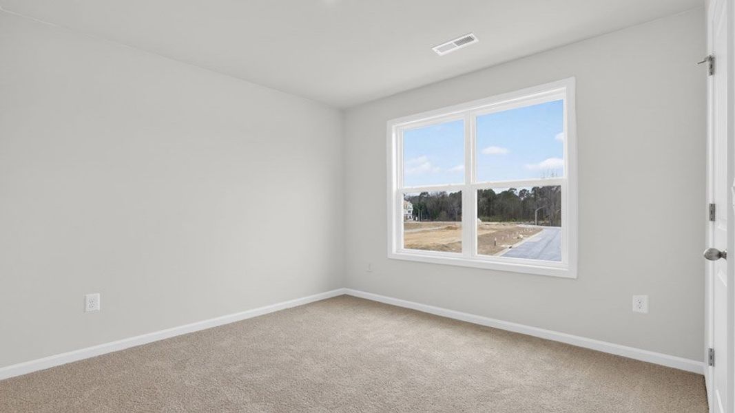 Spacious, unfurnished interior of a new home in Madden West, Fuquay Varina (Image 28).