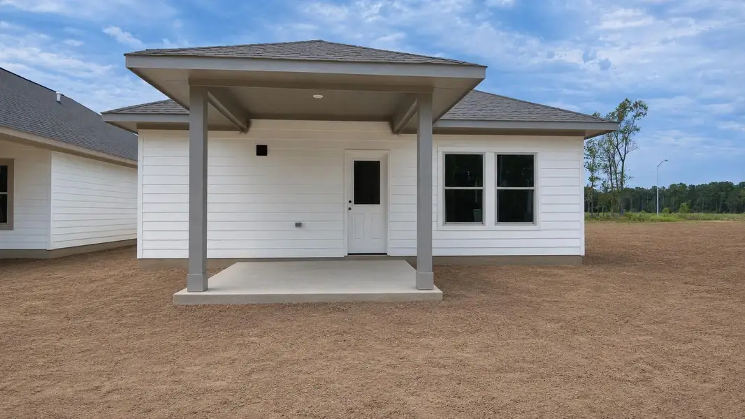 Exterior details and patio area of a home in Sundance Cove, Crosby (Image 3). Exterior details and patio area of a home in Sundance Cove, Crosby (Image 3).