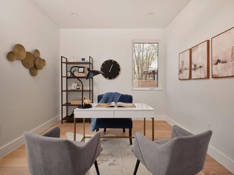 Office with light wood finished floors Office with light wood finished floors