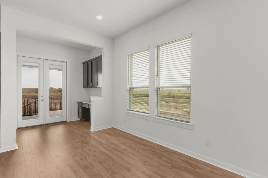 Spacious, unfurnished interior of a new home in The Grove at Blackhawk, Pflugerville (Image 8).