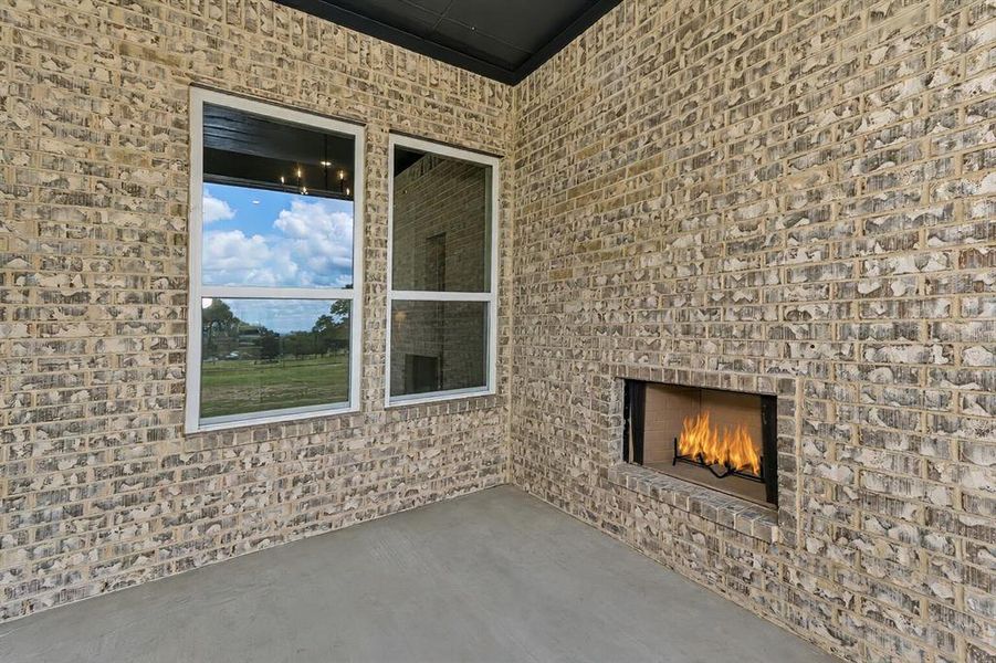 Exterior details and patio area of a home in , Poolville (Image 20).