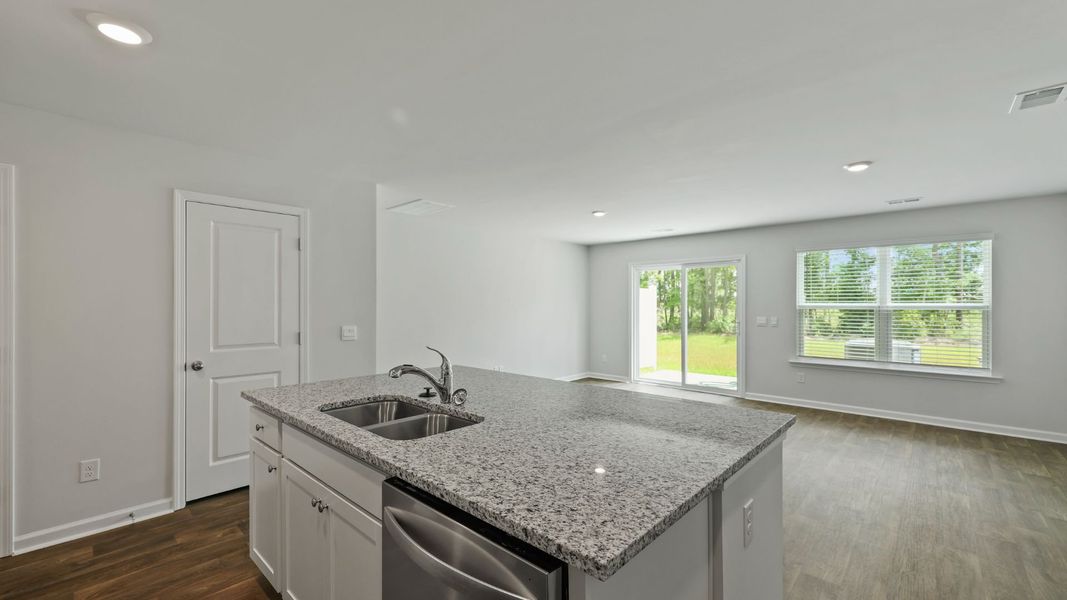 Furnished interior view inside a new home in Pine Hills Townhomes at Cane Bay, Summerville (Image 8).