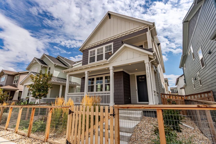 Front exterior of a new home in Arras Park, Thornton, CO, highlighting curb appeal (Image 23). Front exterior of a new home in Arras Park, Thornton, CO, highlighting curb appeal (Image 23).