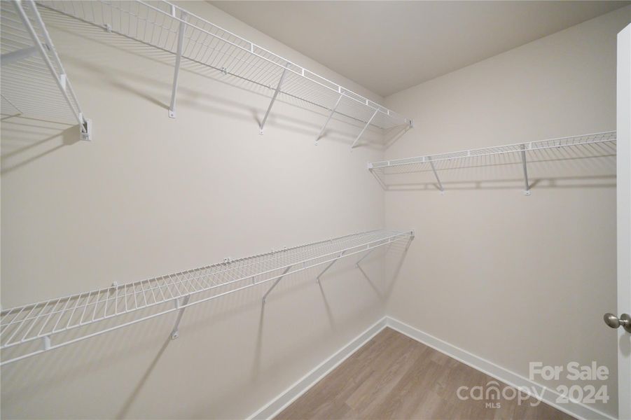 Primary Closet attached to primary bathroom