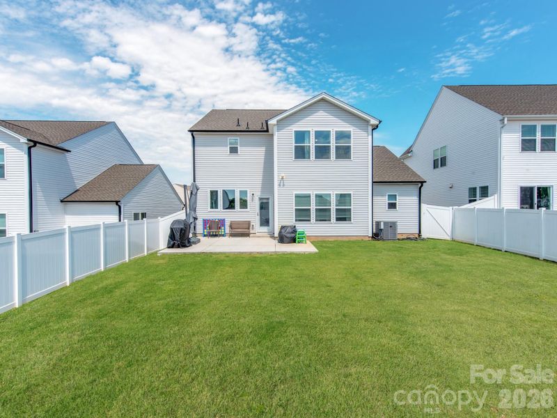 Exterior details and patio area of a home in Sutter's Mill II, Troutman (Image 24).
