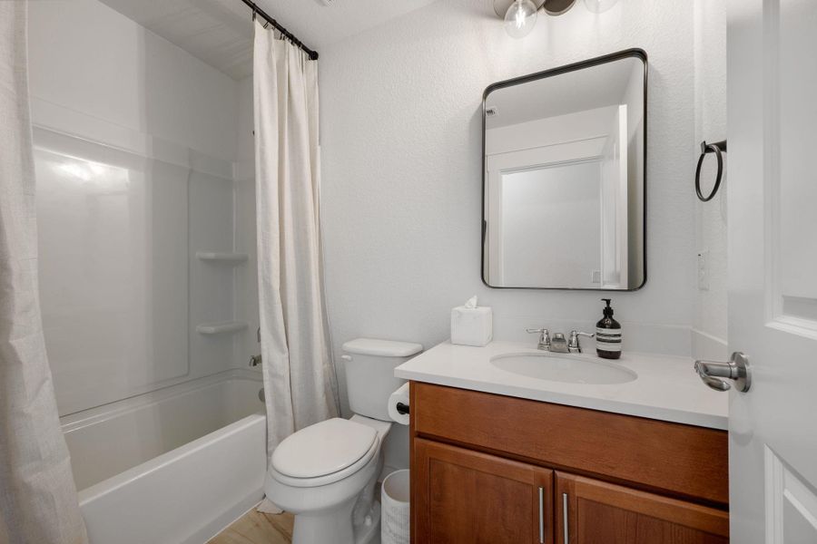 Furnished interior view inside a new home in Sun Chase, Del Valle (Image 19). Furnished interior view inside a new home in Sun Chase, Del Valle (Image 19).