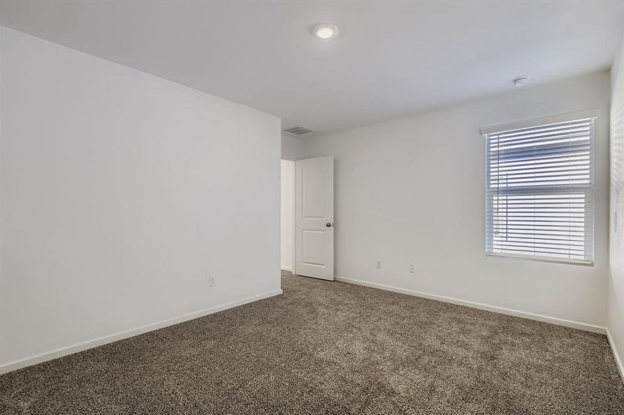 Spacious, unfurnished interior of a new home in Tillage Farms: Wellton Haven, Princeton (Image 28).