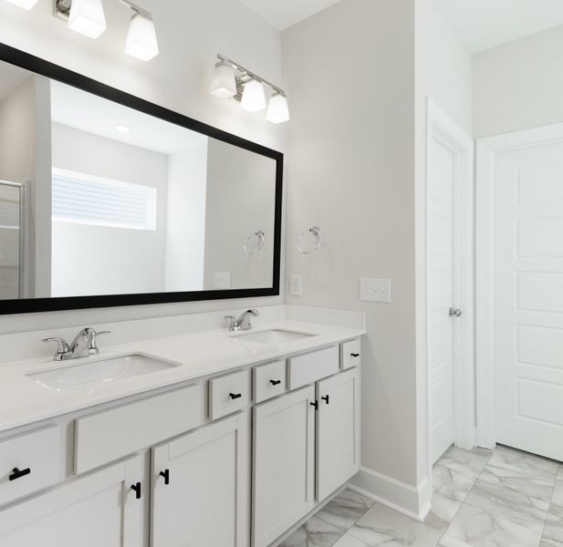 Representative furnished interior of a home built from the The Ivory by Cothran Homes in Holly Ridge, Greenville (Image 12).