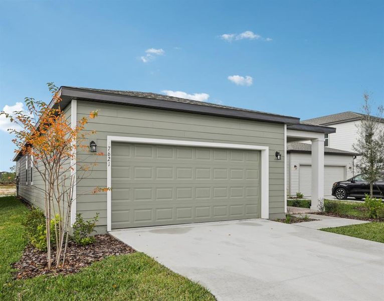 Front exterior of a new home in , Winter Garden, FL, highlighting curb appeal (Image 23).