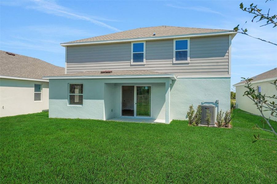 Exterior details and patio area of a home in Willowbrook North, Winter Haven (Image 3).