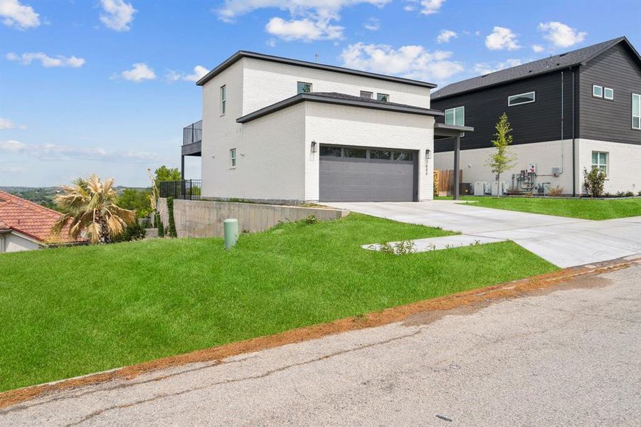 Front exterior of a new home in Hills of Lake Country, Fort Worth, TX, highlighting curb appeal (Image 23).