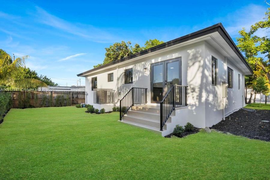 Exterior details and patio area of a home in , Miami (Image 3). Exterior details and patio area of a home in , Miami (Image 3).