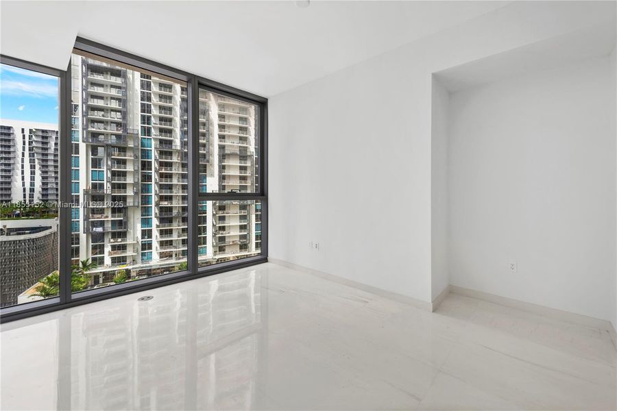 Spacious, unfurnished interior of a new home in Aston Martin Residences, Miami (Image 23).