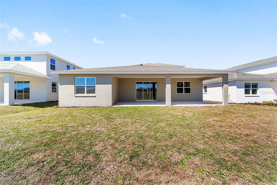 Exterior details and patio area of a home in Calesa Township, Ocala (Image 27).