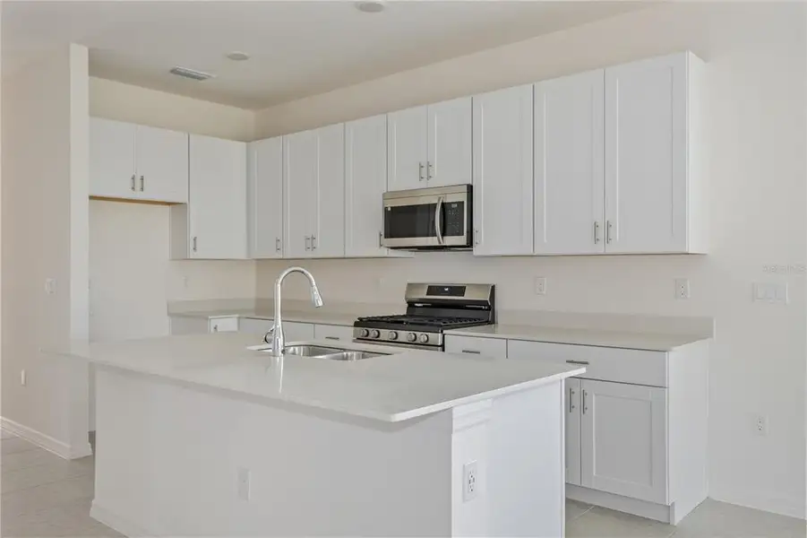 Furnished interior view inside a new home in Highfield at Twisted Oaks, Wildwood (Image 6).