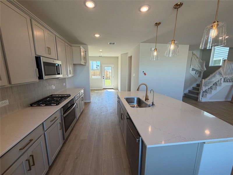 Furnished interior view inside a new home in Lariat, Liberty Hill (Image 9). Furnished interior view inside a new home in Lariat, Liberty Hill (Image 9).