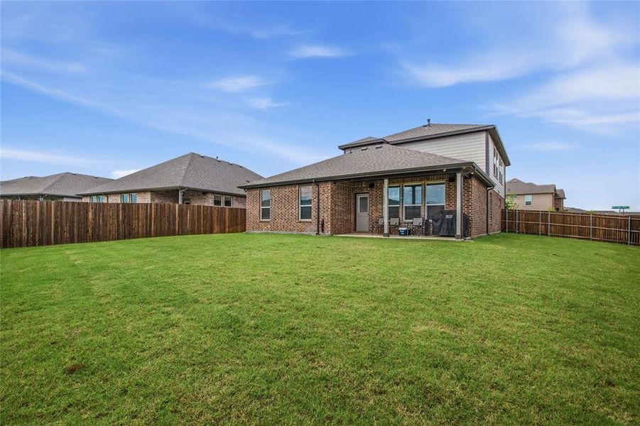 Exterior details and patio area of a home in , Denton (Image 28).