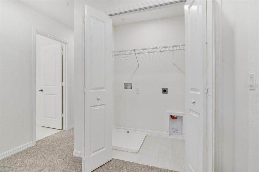 Spacious, unfurnished interior of a new home in Towns at Riverwalk, Sanford (Image 10).